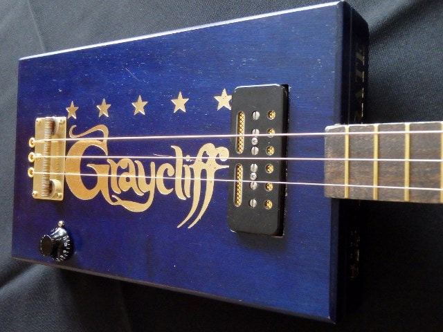 Graycliff Navy Blue & Gold cigar box guitar from Wires and Wood