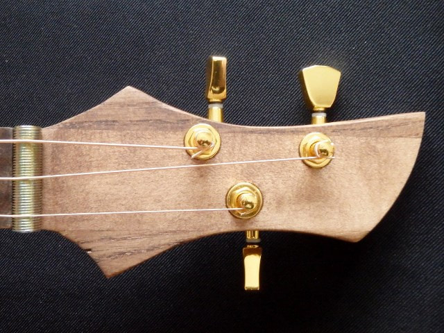 Graycliff Navy Blue & Gold cigar box guitar headstock from Wires and Wood