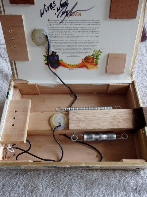 Inside of white Cuaba cigar box guitar by Wires and Wood