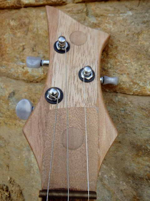 Wooden cigar box guitar headstock from Wires and Wood